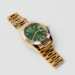 Rolex – Green Dial Gold Watch