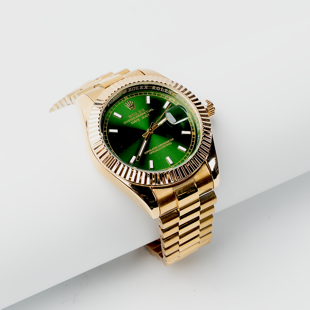 Rolex – Green Dial Gold Watch